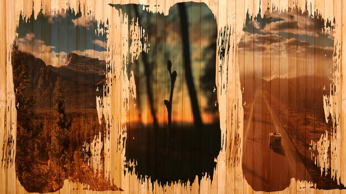 Three paint-brushed windows on wood